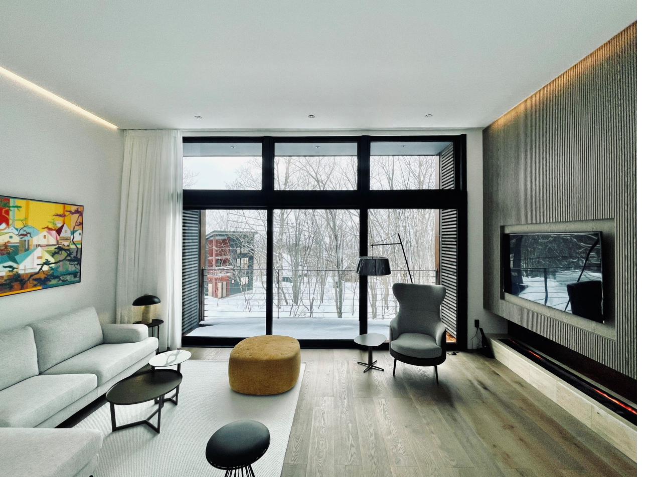 Living room with art and mountain view